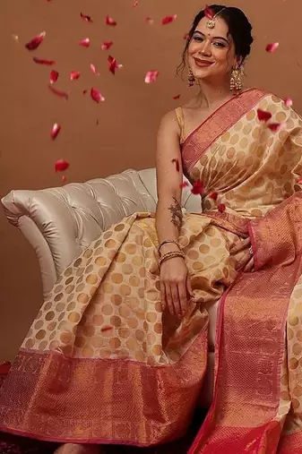 Cream woven art silk traditional saree with blouse piece
