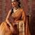 Orange printed cotton blend ethnic saree with blouse piece