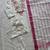 Off-white cotton straight kurta pant set with rani pink dupatta