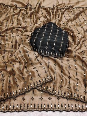 Stunning beige viscose rangoli silk saree with black embroidery and mirror work 2