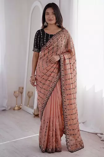 Stunning peach viscose rangoli silk saree with black embroidery and mirror work