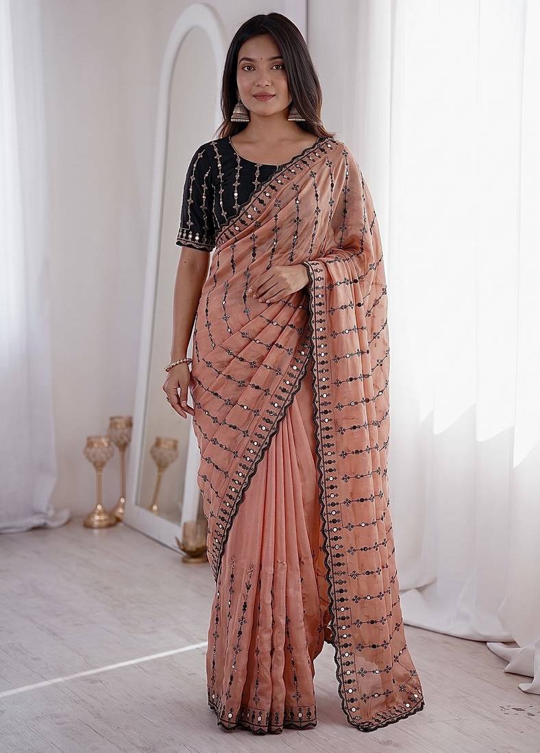 Stunning peach viscose rangoli silk saree with black embroidery and mirror work