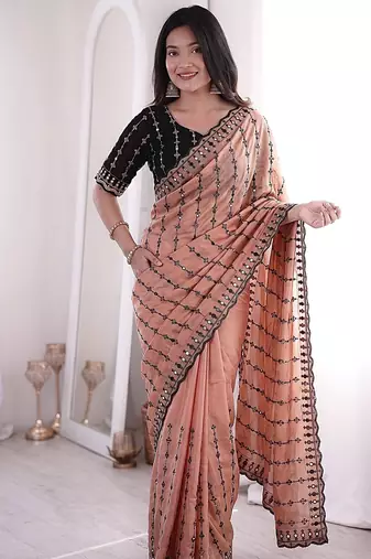 Stunning peach viscose rangoli silk saree with black embroidery and mirror work
