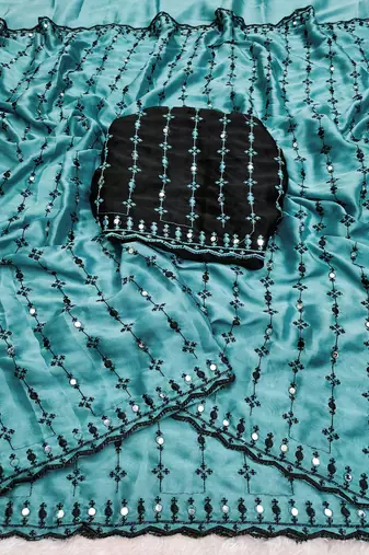 Stunning turquoise viscose rangoli silk saree with black embroidery and mirror work