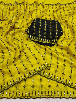 Stunning yellow viscose rangoli silk saree with black embroidery and mirror work 2