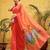 Peach printed silk cotton ethnic saree with blouse piece