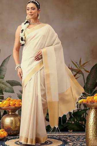 Off white plain silk blend ethnic saree with blouse piece