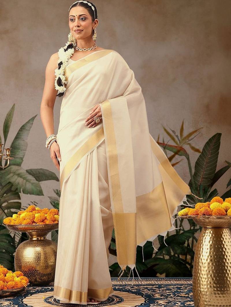 Off white plain silk blend ethnic saree with blouse piece