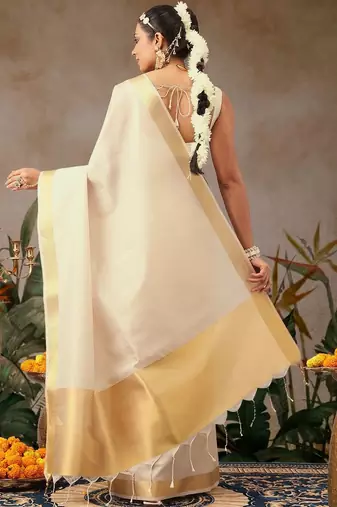 Off white plain silk blend ethnic saree with blouse piece