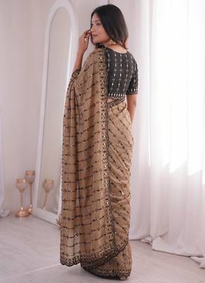 Stunning beige viscose rangoli silk saree with black embroidery and mirror work 4
