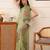 Green printed silk cotton ethnic saree with blouse piece