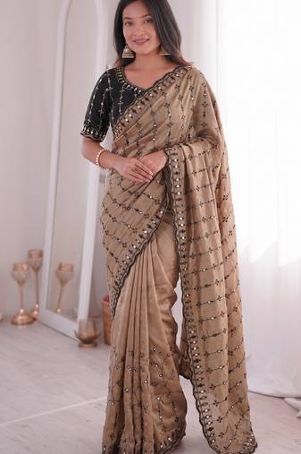 Stunning beige viscose rangoli silk saree with black embroidery and mirror work