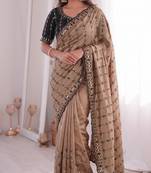 Stunning beige viscose rangoli silk saree with black embroidery and mirror work