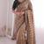 Stunning beige viscose rangoli silk saree with black embroidery and mirror work