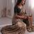 Stunning beige viscose rangoli silk saree with black embroidery and mirror work