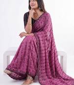 Stunning pink viscose rangoli silk saree with black embroidery and mirror work