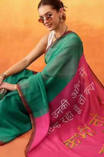 Green printed cotton blend ethnic saree with blouse piece