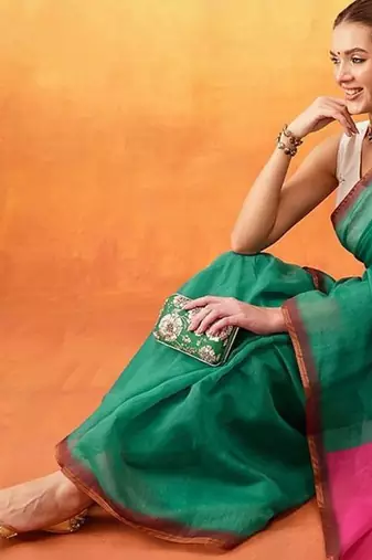 Green printed cotton blend ethnic saree with blouse piece