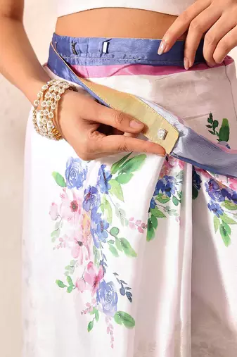 White printed satin party wear saree with blouse piece