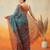 Teal printed cotton blend ethnic saree with blouse piece