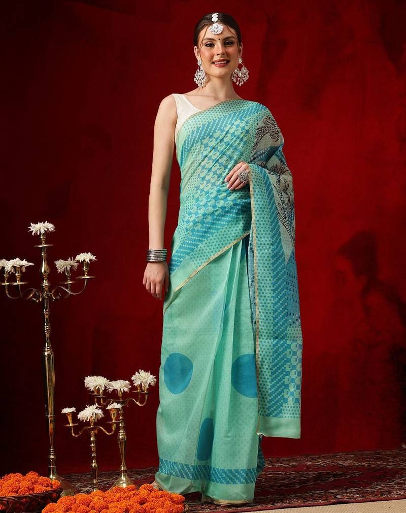 Sea green printed cotton blend ethnic saree with blouse piece