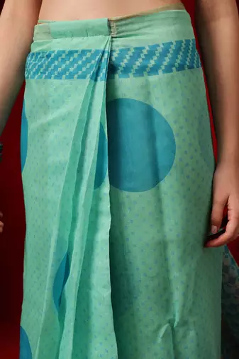 Sea green printed cotton blend ethnic saree with blouse piece