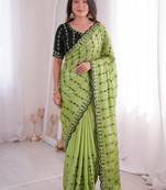 Stunning green viscose rangoli silk saree with black embroidery and mirror work