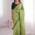 Stunning green viscose rangoli silk saree with black embroidery and mirror work