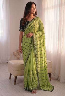Stunning green viscose rangoli silk saree with black embroidery and mirror work 4