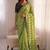 Stunning green viscose rangoli silk saree with black embroidery and mirror work