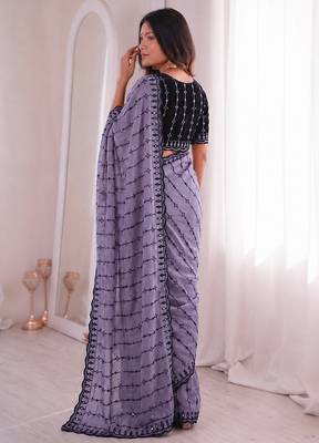 Stunning purple viscose rangoli silk saree with black embroidery and mirror work 4