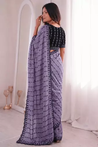 Stunning purple viscose rangoli silk saree with black embroidery and mirror work