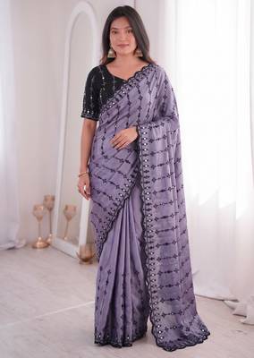 Stunning purple viscose rangoli silk saree with black embroidery and mirror work 1
