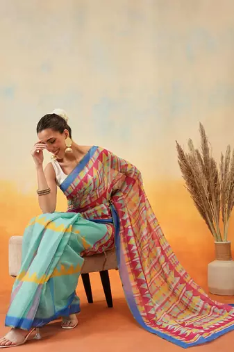 Green printed tissue traditional saree with blouse piece