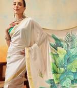 Off white printed art silk ethnic saree with blouse piece