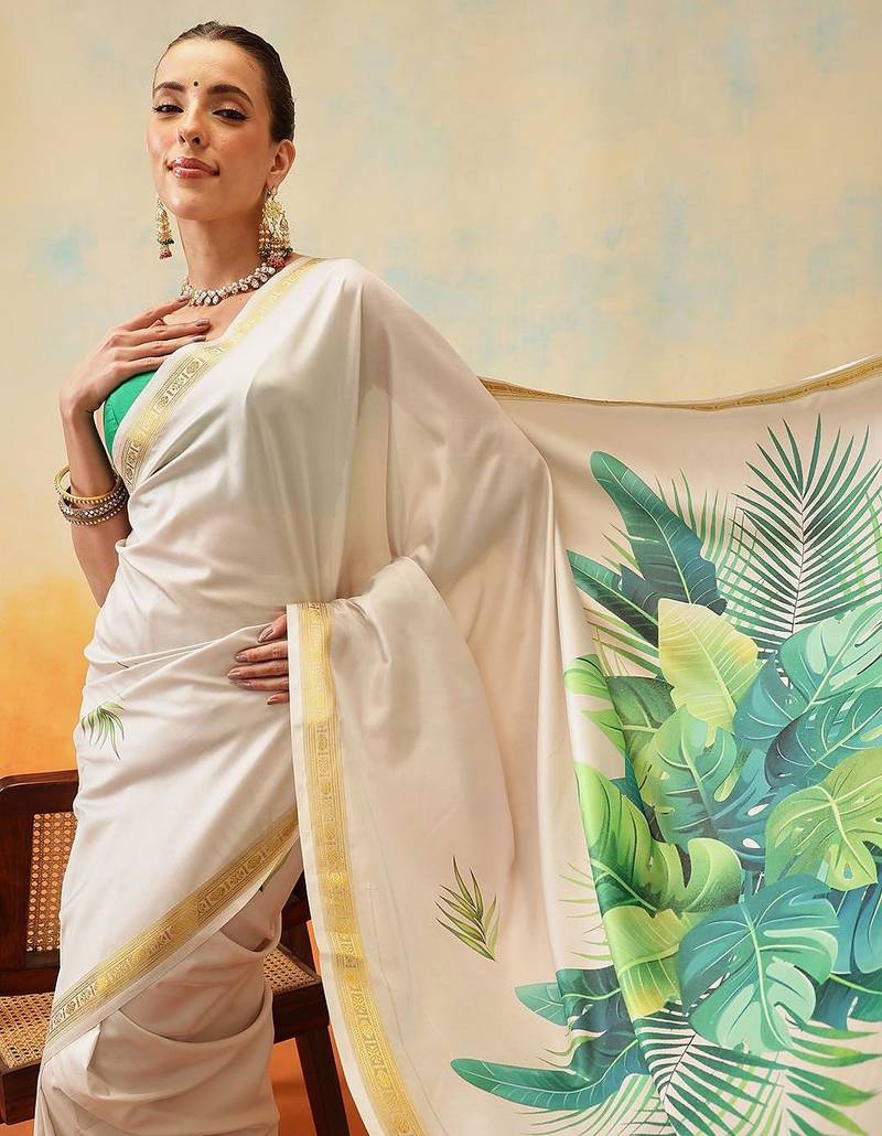 Off white printed art silk ethnic saree with blouse piece