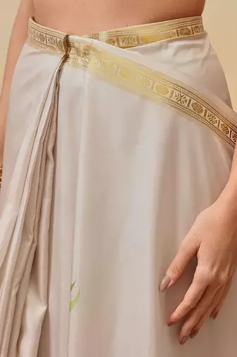 Off white printed art silk ethnic saree with blouse piece