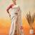 Off white printed art silk ethnic saree with blouse piece