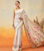 Off white printed art silk ethnic saree with blouse piece
