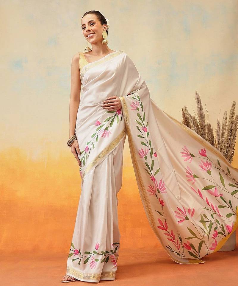 Off white printed art silk ethnic saree with blouse piece