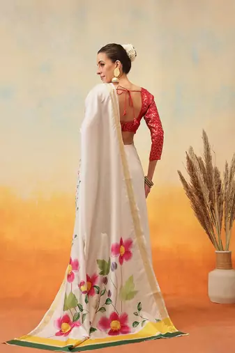 Off white printed art silk ethnic saree with blouse piece