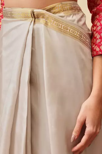 Off white printed art silk ethnic saree with blouse piece