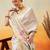 Off white printed art silk ethnic saree with blouse piece