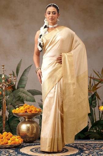 Cream woven silk blend ethnic saree with blouse piece