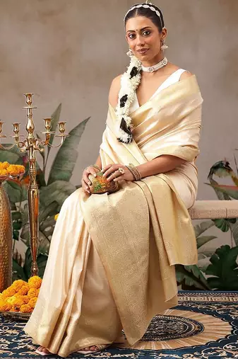 Cream woven silk blend ethnic saree with blouse piece