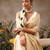Cream woven silk blend ethnic saree with blouse piece