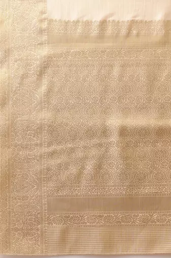 Cream woven silk blend ethnic saree with blouse piece