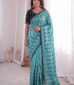 Stunning turquoise viscose rangoli silk saree with black embroidery and mirror work