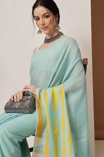 Teal plain cotton blend festive saree with blouse piece