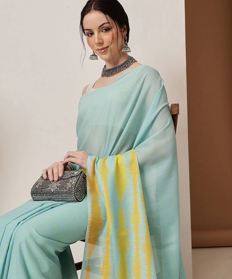Teal plain cotton blend festive saree with blouse piece